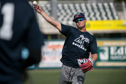 Jose Miranda warms up at practice for the Fort Myers Miracle on Tuesday, April 2, 2019.