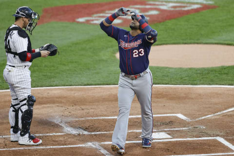 Minnesota Twins designated hitter Nelson Cruz crosses home plate after hitting a solo home run against the Chicago White Sox. Mandatory Credit: Kamil Krzaczynski-USA TODAY Sports