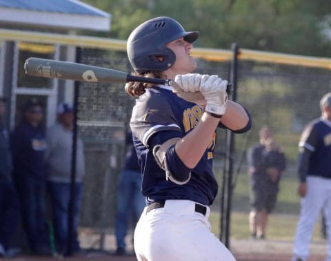 Minnesota Twins drafted prospect Noah Miller watches his home run leave the park.