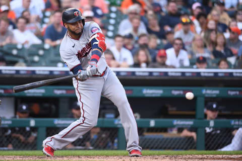 Minnesota Twins designated hitter Nelson Cruz hits an RBI single during the fifth inning against the Detroit Tigers at Comerica Park. Mandatory Credit: Tim Fuller-USA TODAY Sports