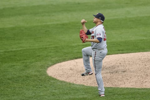 Minnesota Twins relief pitcher Hansel Robles celebrates after delivering a final out against the Chicago White Sox during the eighth inning of a Game 1 of the doubleheader at Guaranteed Rate Field. Mandatory Credit: Kamil Krzaczynski-USA TODAY Sports