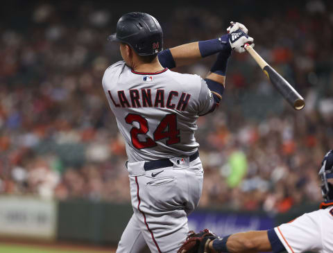 Minnesota Twins right fielder Trevor Larnach hits an RBI double during the second inning against the Houston Astros. (Troy Taormina-USA TODAY Sports)