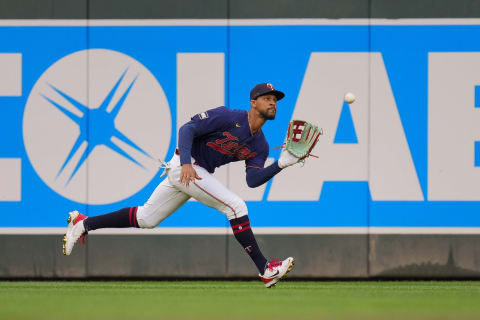 Minnesota Twins outfielder Byron Buxton fields a fly ball against the Milwaukee Brewers in the second inning at Target Field. Mandatory Credit: Brad Rempel-USA TODAY Sports