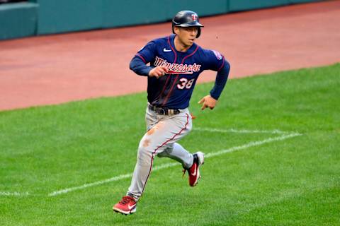 Minnesota Twins left fielder Rob Refsnyder scores against the Cleveland Indians in the fifth inning at Progressive Field. (David Richard-USA TODAY Sports)