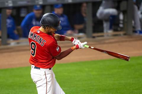 Minnesota Twins shortstop Andrelton Simmons hits a single in the fourth inning against the Kansas City Royals at Target Field. Mandatory Credit: (Jesse Johnson-USA TODAY Sports)