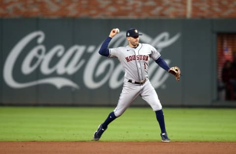 Houston Astros shortstop Carlos Correa throws to first base for the out. (Credit: Brett Davis-USA TODAY Sports)