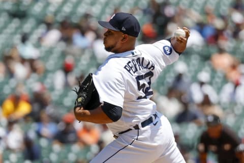 Detroit Tigers relief pitcher Wily Peralta pitches in the fifth inning against the Kansas City Royals. (Rick Osentoski-USA TODAY Sports)