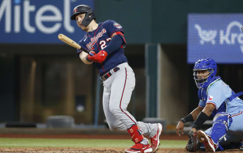 Minnesota Twins catcher Ryan Jeffers singles in a run against the Texas Rangers. (Tim Heitman-USA TODAY Sports)