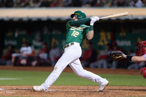 Oakland Athletics catcher Sean Murphy hits a single during the third inning against the Los Angeles Angels. (Stan Szeto-USA TODAY Sports)