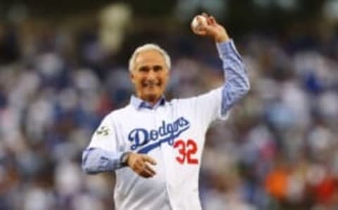 Nov 1, 2017; Los Angeles, CA, USA; Los Angeles Dodgers former pitcher Sandy Koufax throws out the ceremonial first pitch before game seven of the 2017 World Series against the Houston Astros at Dodger Stadium. Mandatory Credit: Tim Bradbury/Pool Photo via USA TODAY Sports