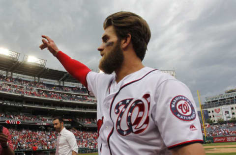 Apr 16, 2017; Washington, DC, USA; Washington Nationals right fielder Bryce Harper (34) waves to the crowd while leaving the field after hitting a game-winning walk-off three run home run against the Philadelphia Phillies in the bottom of the ninth inning at Nationals Park. The Nationals won 6-4. Mandatory Credit: Geoff Burke-USA TODAY Sports