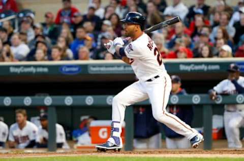 Apr 17, 2017; Minneapolis, MN, USA; Minnesota Twins left fielder Eddie Rosario (20) hits a RBI single during the second inning against the Cleveland Indians at Target Field. Mandatory Credit: Jordan Johnson-USA TODAY Sports