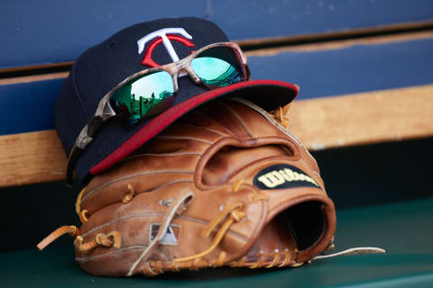 Apr 13, 2017; Detroit, MI, USA; Minnesota Twins hat and glove in the dugout during the game against the Minnesota Twins at Comerica Park. Mandatory Credit: Rick Osentoski-USA TODAY Sports