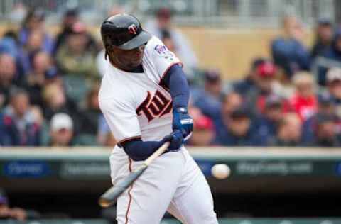 May 18, 2017; Minneapolis, MN, USA; Minnesota Twins third baseman Miguel Sano (22) singles in the eighth inning against the Colorado Rockies at Target Field. Mandatory Credit: Brad Rempel-USA TODAY Sports