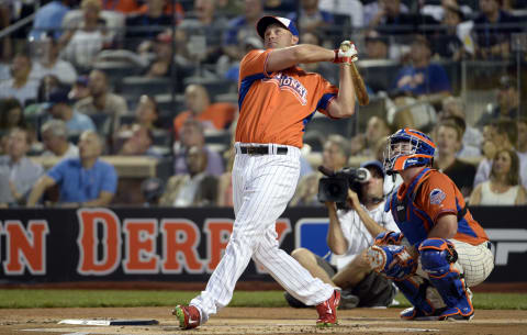 Jul 15, 2013; Flushing , NY, USA; National League outfielder Michael Cuddyer (3) of the Colorado Rockies at bat during the Home Run Derby in advance of the 2013 All Star Game at Citi Field. Mandatory Credit: Robert Deutsch-USA TODAY Sports