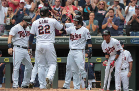 Sep 4, 2016; Minneapolis, MN, USA; Minnesota Twins center fielder Byron Buxton (25) celebrates with first baseman Trevor Plouffe (24) and third baseman Miguel Sano (22) and second baseman Brian Dozier (2) right fielder Max Kepler (26) after hitting a grand slam during the second inning against the Chicago White Sox at Target Field. Mandatory Credit: Jordan Johnson-USA TODAY Sports