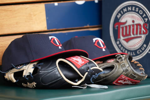 Apr 13, 2017; Detroit, MI, USA; Minnesota Twins hat and glove in the dugout during the game against the Minnesota Twins at Comerica Park. Mandatory Credit: Rick Osentoski-USA TODAY Sports