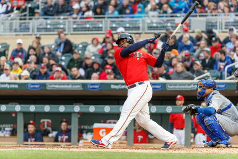 May 19, 2017; Minneapolis, MN, USA; Minnesota Twins third baseman Miguel Sano (22) hits a single during the second inning against the Kansas City Royals at Target Field. Mandatory Credit: Jordan Johnson-USA TODAY Sports