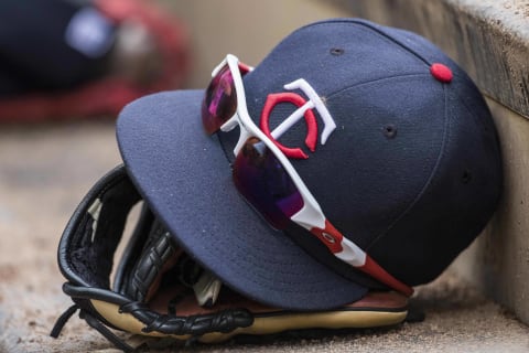 Jun 20, 2015; Minneapolis, MN, USA; A view of a Minnesota Twins hat and glove in the dug out during the second inning against the Chicago Cubs at Target Field. Mandatory Credit: Jesse Johnson-USA TODAY Sports