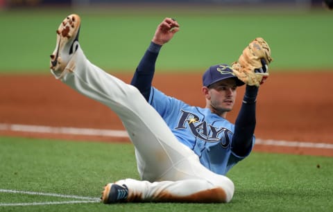 Daniel Robertson flashing the glove. (Photo by Mike Carlson/Getty Images)