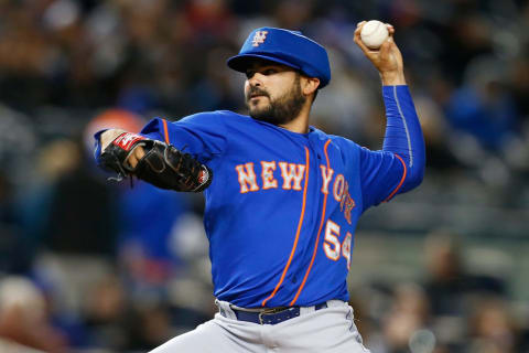 Alex Torres in the protective hat that earned him the nickname “Dark Helmet.” (Photo by Mike Stobe/Getty Images)