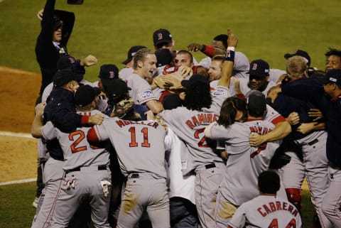 ST. LOUIS – OCTOBER 27: The Boston Red Sox celebrate after winning game four of the 2004 World Series against the St. Louis Cardinals at Busch Stadium on October 27, 2004 in St. Louis, Missouri. The Red Sox defeated the Cardinals 3-0 to win their first World Series in 86 years. (Photo by Ron Vesely/MLB Photos via Getty Images)