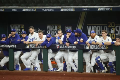 Los Angeles Dodgers teammates watch from the dugout in the 9th inning against the Tampa Bay Rays in game two of the 2020 World Series at Globe Life Field. Mandatory Credit: Kevin Jairaj-USA TODAY Sports