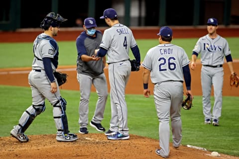 Tampa Bay Rays manager Kevin Cash takes starting pitcher Blake Snell (4) out of the game during the sixth inning against the Los Angeles Dodgers during game six of the 2020 World Series at Globe Life Field. Mandatory Credit: Tim Heitman-USA TODAY Sports