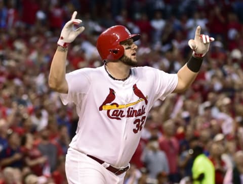 Oct 7, 2014; St. Louis, MO, USA; St. Louis Cardinals first baseman Matt Adams (32) celebrates after hitting a three-run home run against the Los Angeles Dodgers in the 7th inning during game four of the 2014 NLDS baseball playoff game at Busch Stadium. Mandatory Credit: Scott Rovak-USA TODAY Sports