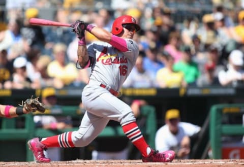 May 10, 2015; Pittsburgh, PA, USA; St. Louis Cardinals second baseman Kolten Wong (16) hits a two run home run against the Pittsburgh Pirates during the sixth inning at PNC Park. Mandatory Credit: Charles LeClaire-USA TODAY Sports