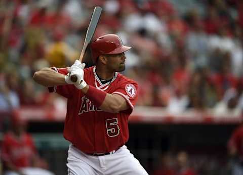 Jun 27, 2015; Anaheim, CA, USA; Los Angeles Angels first baseman Albert Pujols (5) prepares to bat against the Seattle Mariners during the first inning at Angel Stadium of Anaheim. Mandatory Credit: Kelvin Kuo-USA TODAY Sports