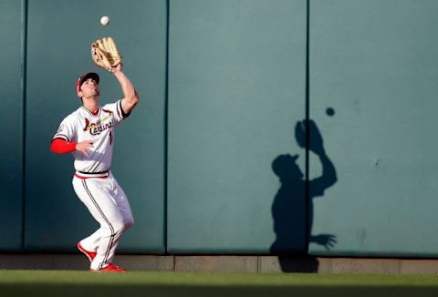 Jul 23, 2015; St. Louis, MO, USA; St. Louis Cardinals left fielder Randal Grichuk (15) catches for an out during a baseball game against the Kansas City Royals at Busch Stadium. Mandatory Credit: Scott Kane-USA TODAY Sports