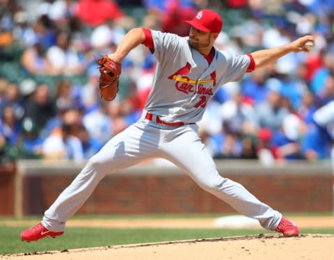 Jul 7, 2015; Chicago, IL, USA; St. Louis Cardinals starting pitcher Tyler Lyons (70) pitches during the first inning against the Chicago Cubs in game one of a baseball doubleheader at Wrigley Field. Mandatory Credit: Caylor Arnold-USA TODAY Sports