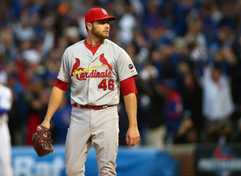 October 13, 2015; Chicago, IL, USA; St. Louis Cardinals relief pitcher Kevin Siegrist (46) reacts after giving up a solo home run to Chicago Cubs first baseman Anthony Rizzo (not pictured) in the sixth inning in game four of the NLDS at Wrigley Field. Mandatory Credit: Jerry Lai-USA TODAY Sports