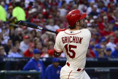 Oct 10, 2015; St. Louis, MO, USA; St. Louis Cardinals pinch hitter Randal Grichuk (15) hits a solo home run against the Chicago Cubs during the fifth inning in game two of the NLDS at Busch Stadium. Mandatory Credit: Jeff Curry-USA TODAY Sports