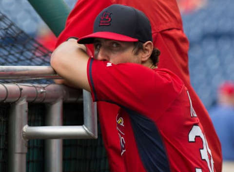 Jun 20, 2015; Philadelphia, PA, USA; St. Louis Cardinals shortstop Pete Kozma (38) leans on the batting cage prior to a game against the Philadelphia Phillies at Citizens Bank Park. Mandatory Credit: Bill Streicher-USA TODAY Sports