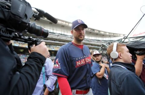 Jul 14, 2014; Minneapolis, MN, USA; National League pitcher Adam Wainwright (50) of the St. Louis Cardinals takes the field for workout day the day before the 2014 MLB All Star Game at Target Field. Mandatory Credit: Jerry Lai-USA TODAY Sports