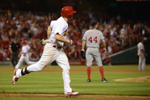 Sep 1, 2015; St. Louis, MO, USA; St. Louis Cardinals first baseman Brandon Moss (21) hits a walk-off three run home run off of Washington Nationals relief pitcher Casey Janssen (not pictured) during the ninth inning at Busch Stadium. The Cardinals defeated the Nationals 8-5. Mandatory Credit: Jeff Curry-USA TODAY Sports