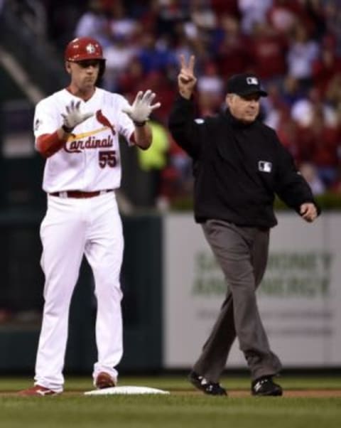 Oct 9, 2015; St. Louis, MO, USA; St. Louis Cardinals left fielder Stephen Piscotty reacts after hitting a ground rule double against the Chicago Cubs in the first inning in game one of the NLDS at Busch Stadium. Mandatory Credit: Scott Rovak-USA TODAY Sports