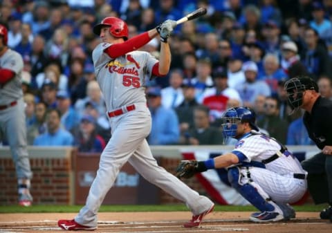 October 13, 2015; Chicago, IL, USA; St. Louis Cardinals left fielder Stephen Piscotty (55) hits a two run home run in the first inning against Chicago Cubs in game four of the NLDS at Wrigley Field. Mandatory Credit: Jerry Lai-USA TODAY Sports