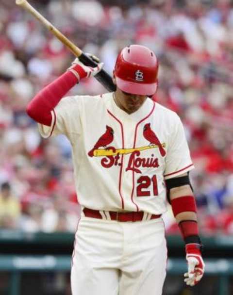 Apr 26, 2014; St. Louis, MO, USA; St. Louis Cardinals first baseman Allen Craig (21) reacts after striking out during the eighth inning against the Pittsburgh Pirates at Busch Stadium. Pittsburgh defeated St. Louis 6-1. Mandatory Credit: Jeff Curry-USA TODAY Sports