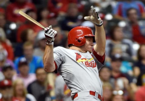 Sep 17, 2015; Milwaukee, WI, USA; St. Louis Cardinals right fielder Brandon Moss (21) breaks his bat while grounding out in the second inning against the Milwaukee Brewers at Miller Park. Mandatory Credit: Benny Sieu-USA TODAY Sports