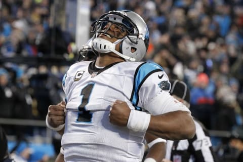 Jan 24, 2016; Charlotte, NC, USA; Carolina Panthers quarterback Cam Newton (1) celebrates after scoring a touchdown during the third quarter against the Arizona Cardinals in the NFC Championship football game at Bank of America Stadium. Mandatory Credit: Jeremy Brevard-USA TODAY Sports