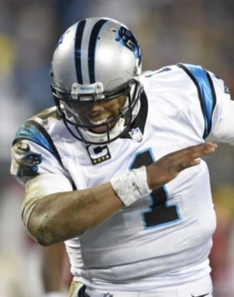 Jan 24, 2016; Charlotte, NC, USA; Carolina Panthers quarterback Cam Newton (1) dabs during the fourth quarter against the Arizona Cardinals in the NFC Championship football game at Bank of America Stadium. Mandatory Credit: John David Mercer-USA TODAY Sports