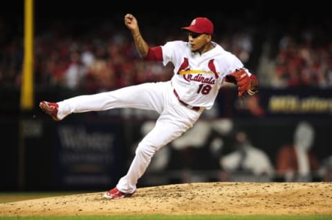 Sep 4, 2015; St. Louis, MO, USA; St. Louis Cardinals starting pitcher Carlos Martinez (18) throws the ball against the Pittsburgh Pirates during the third inning at Busch Stadium. Mandatory Credit: Jeff Curry-USA TODAY Sports