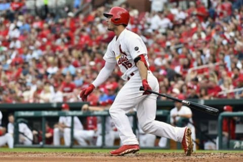 Aug 13, 2015; St. Louis, MO, USA; St. Louis Cardinals left fielder Randal Grichuk (15) hits a single off of Pittsburgh Pirates starting pitcher Francisco Liriano (not pictured) at Busch Stadium. Mandatory Credit: Jasen Vinlove-USA TODAY Sports