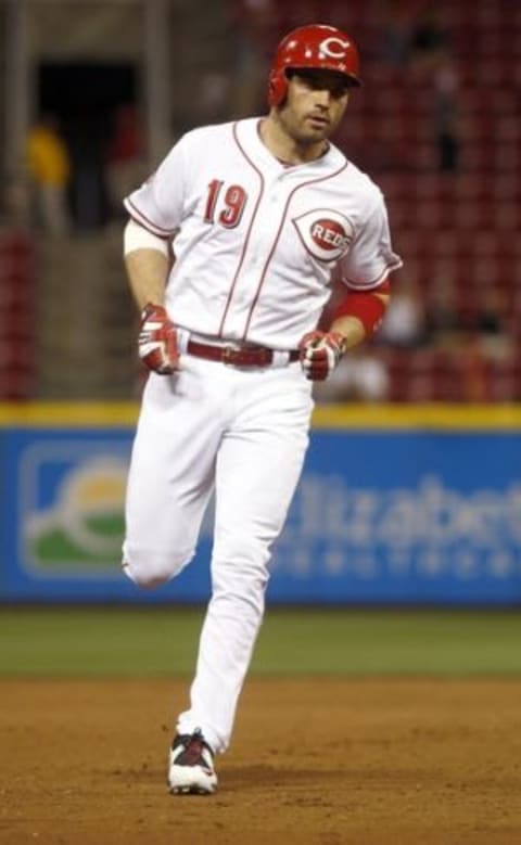 Aug 24, 2015; Cincinnati, OH, USA; Cincinnati Reds first baseman Joey Votto rounds the bases after hitting a two-run home run against the Detroit Tigers in the ninth inning at Great American Ball Park. The Reds defeated the Tigers 12-5. Mandatory Credit: David Kohl-USA TODAY Sports