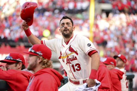 Oct 10, 2015; St. Louis, MO, USA; St. Louis Cardinals third baseman Matt Carpenter (13) celebrates after hitting a solo home run against the Chicago Cubs during the first inning in game two of the NLDS at Busch Stadium. Mandatory Credit: Jeff Curry-USA TODAY Sports