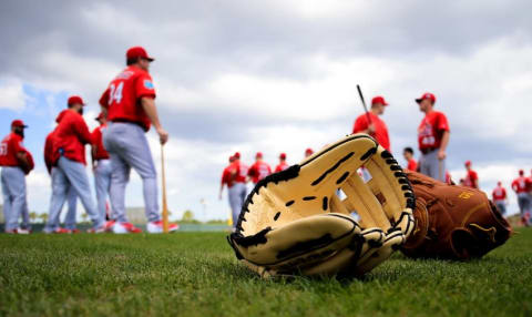 Feb 18, 2016; Jupiter, FL, USA; A general view of two MLB gloves on the practice field at Roger Dean Stadium. Mandatory Credit: Steve Mitchell-USA TODAY Sports