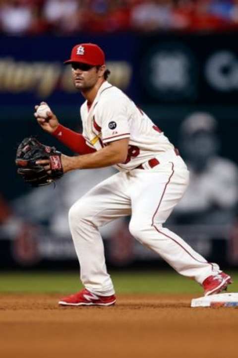 Jul 18, 2015; St. Louis, MO, USA; St. Louis Cardinals shortstop Pete Kozma (38) looks to make a play during a baseball game against the New York Mets at Busch Stadium. The Cardinals won 12-2. Mandatory Credit: Scott Kane-USA TODAY Sports